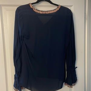 Very lightly used Ainu Halperin top. All parts of top completely in tact.